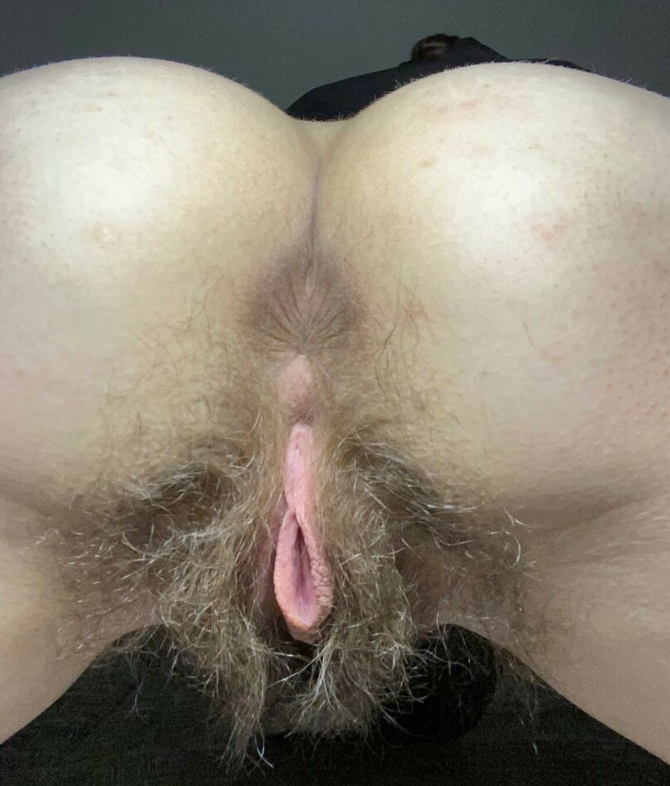 Woman showing her asshole and blonde hairy pussy