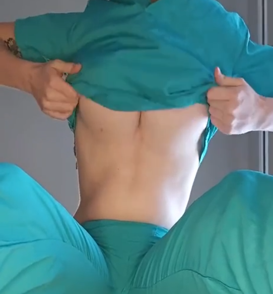 Nurse removing her clothes