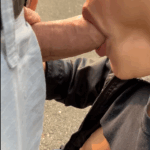 Woman gives a blowjob in public