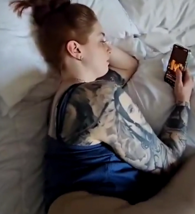 Woman watches porn on her phone while fucked by her boyfriend