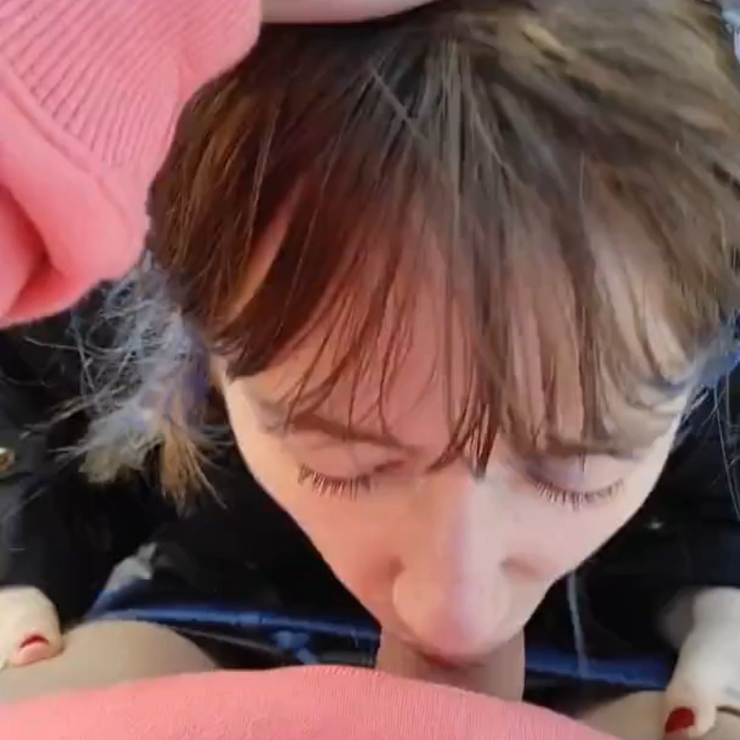 brunette with a cock in her mouth