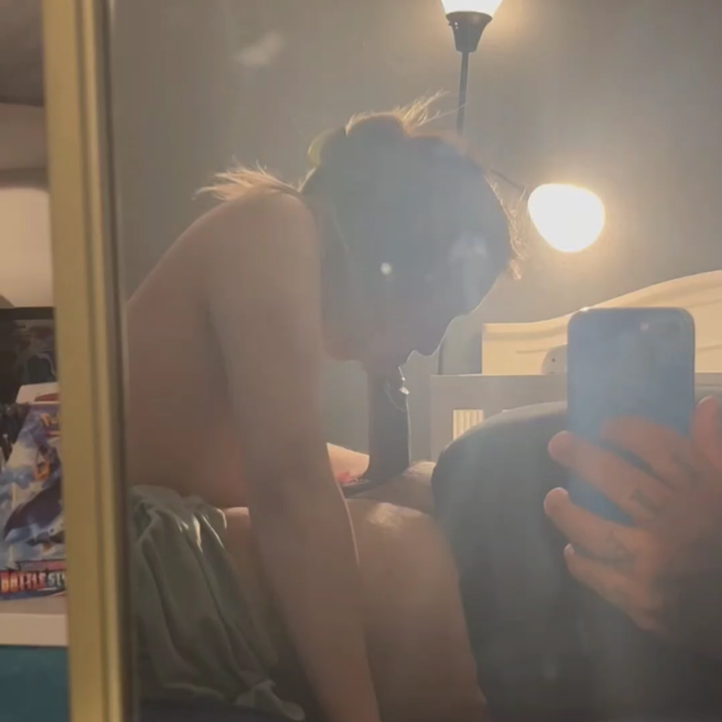 couple filming sex thru a mirror