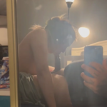 couple filming sex thru a mirror
