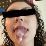 curly haired chick getting a bukakke