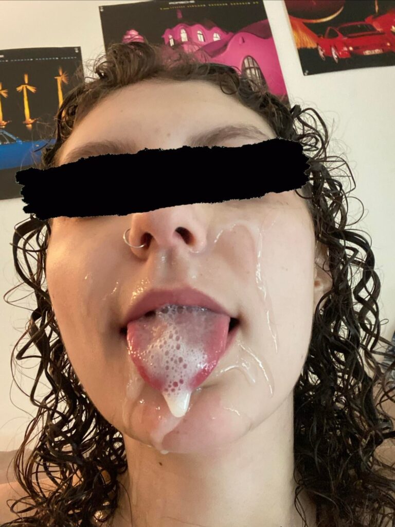curly haired chick getting a bukakke